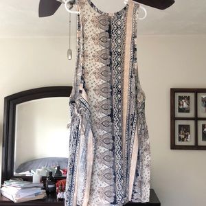 high neck tank top, tied open sides